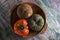 Sapote, cherimoya and heirloom tomato in a bowl