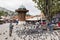 Sarajevo, Bosnia-Herzegovina, July 16 2017: Man feeds pigeons in Sarajevo