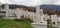 Sarajevo, Yusnia and Herzegovina, March 8, 2020. Muslim cemetery with white monuments and pillars against the sky and distant