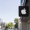 Saratov, Russia - 08/24/2019: Sign on a store with the logo of the popular Apple company, outdoor advertising