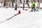 Saratov / Russia - March 8, 2018: Children ride with an ice slide. Winter vacation. Outdoor activity. Winter day in the city Park