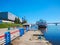 Saratov / Russia - May 2, 2018: Four-deck ship `General Lavrinenkov` at the pier in the city of Saratov. Volga river. Road bridge