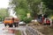 Saratov, Russiaâ€“ May 15, 2020: Pavement repair, road repair in the city. The truck brought in repair materials