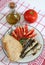 Sardines bread and tomato vertical
