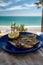 Sardines espeto prepared on skewers and open flame on fireplace with olive trees wood, served outdoor and view on blue sea, Malaga
