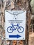 Sardinia. Eco-soustainable tourism. Cycle touring. Signal on a tree