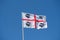 Sardinia flag waving against blue sky