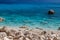 Sardinia, holidays, sea and rocks. The beach near Cala Biriola, sea with crystal clear azure water.