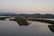 Sardinia. Natural environments. Coastal pond of Porto Botte at twilight 