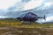 Sarek, Sweden - September 09, 2013: The helicopter takes off after landing passengers in the mountains. Sarek