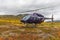 Sarek, Sweden - September 09, 2013: The helicopter takes off after landing passengers in the mountains. Sarek