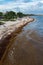 Sargassum algae covers the popular vacation beach of Playa Del C