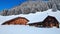 SARNEN, SWITZERLAND - FEBRUARY, 2023. Tourists at Alpine farm chalets