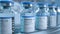 SARS-COV-2 COVID-19 Coronavirus Vaccine Mass Production in Laboratory, Bottles with Branded Labels