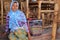 Sasak woman from village selling batik in Lombok