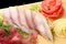 Sashimi hamachi on a board closeup