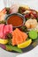Sashimi set from raw seafood: salmon, tuna, eel, perch, shrimps, sea scallop. Traditional japanesse dish - sashimi on white