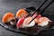 Sashimi sushi with chopsticks and soy