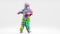 Sasquatch or yeti, funny cartoon character hairy beast dancing on white background. Man in colorful furry monster