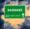 SASSARI road sign against clear blue sky