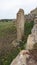 Sassari, Sardinia in Italy, May 18 2023. A menhir in front of the sacred altar of Monte d\'Accoddi.