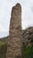 Sassari, Sardinia in Italy, May 18 2023. A menhir in front of the sacred altar of Monte d\'Accoddi.