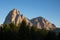 Sassolungo during early sundown in Summer. Above Selva di Val Gardena and Santa Christina the Langkofel with Trees in the