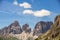 The Sassolungo Maountain range seen from Passo Pordoi during Summer. Langkofel in the Dolomites above Passo Sella in the Dolomites