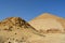 The satellite and the bent pyramids, Satellite one is located 55 meters south to the bent pyramid of king Sneferu, 26 meters in