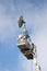 Satellite communications system raised on platform to relay