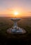 A satellite dish at Goonhilly Satellite Earth Station pointing skywards at sunset