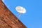 Satellite dish mounted on the grunge brick wall