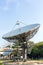 Satellite dish radar antenna station in field. parabolic antennas. Big parabolic antenna against sky. Satellite dish at earth stat