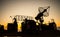 Satellite dishes or radio antennas against evening sky. Selective focus