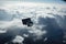 satellite, hovering high above the clouds, with view of sprawling landscape below