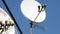 Satellite parabolic dish and signal receivers. TV antenna on wall of house. Yagi