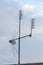 Satellite TV house antena with cloudy natural background