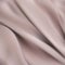 Satin Silky Cloth,Fabric Textile Drape with Crease Wavy Folds.with soft waves,waving in the wind.Texture of crumpled paper. Milk,