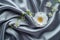 Satin sophistication grey cloth texture with delicate floral accents