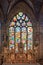 Satined glass window and altar of the church of Pleyben in FinistÃ¨re Brittany France