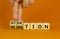 Satisfaction and recognition symbol. Businessman turns cubes changes the word recognition to satisfaction. Beautiful orange