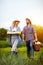 Satisfied couple returning from business in garden