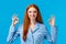 Satisfied good-looking redhead woman saying alright, show okay gesture in confirmation, recommend product, give positive