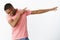 Satisfied happy and charismatic joyful african american young guy making dab pulling hands right tilting, looking down