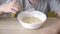 Satisfied little boy eating cereal with milk for breakfast.