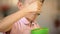 Satisfied little boy eating cornflakes for breakfast, childhood nutrition, snack