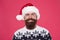 Satisfied Santa. Barber services. Happy barber in fashionable santa style. Bearded man with mustache. Holiday