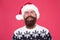 Satisfied Santa. Facial hair concept. Barbershop. Barber hipster. Barber services. Happy barber in fashionable santa