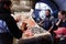 Satisfied seller and buyers near a market counter in Piscaria Mercato del Pesce