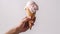 Satisfying Summer Treat, Handheld Milk Ice Cream on a Crispy Waffle Cone Held by a Mans Hand. Generative AI